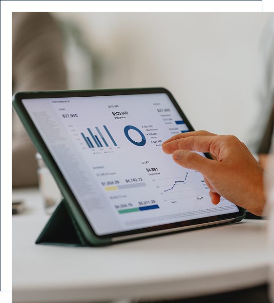 Tablet displaying financial graphs and data analysis.